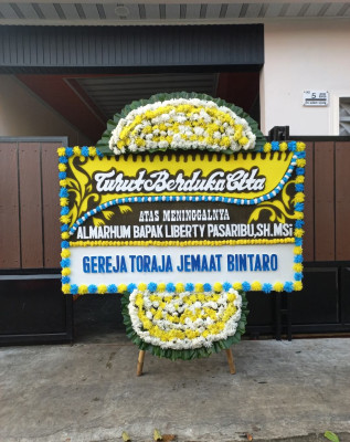 Papan Bunga Duka di Juata Laut